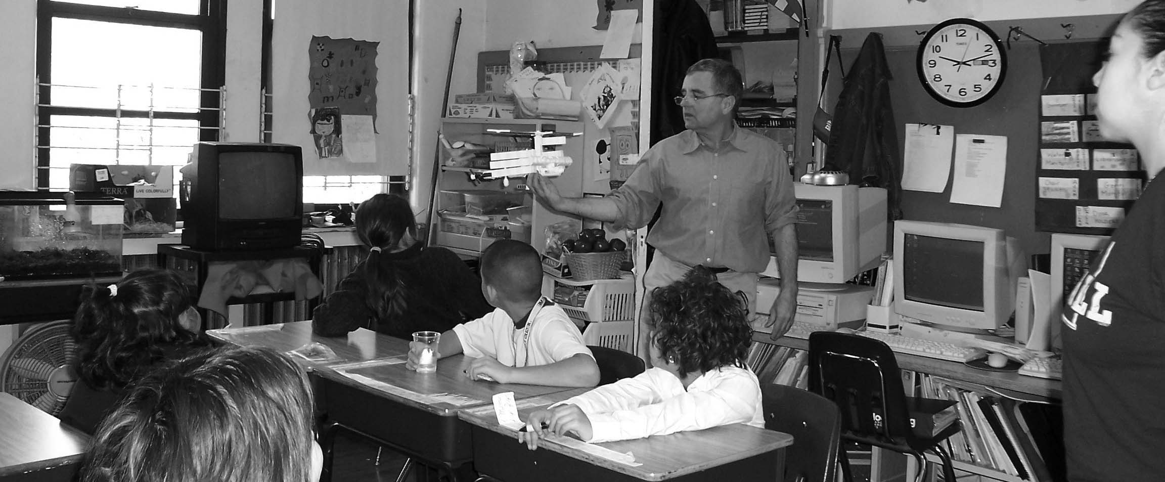 Bill speaking to students