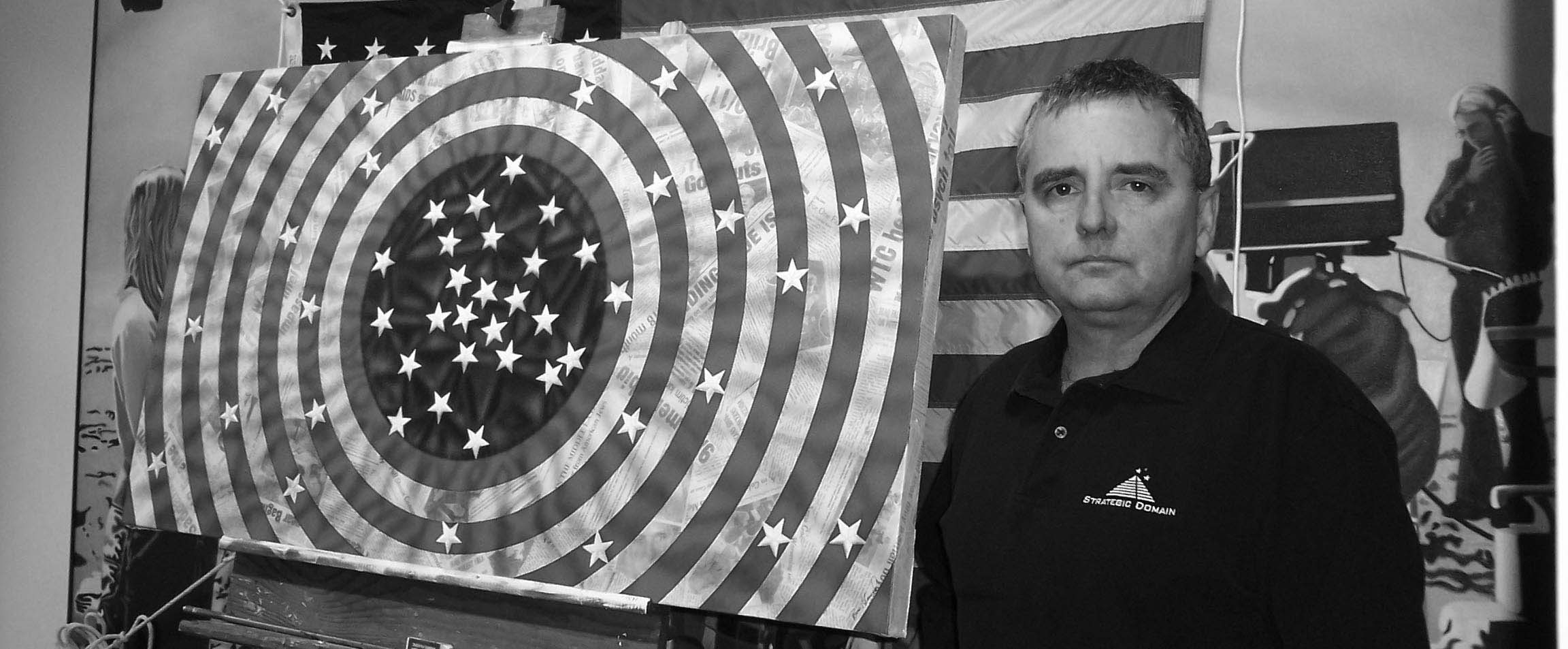 Bill next to Flag painting